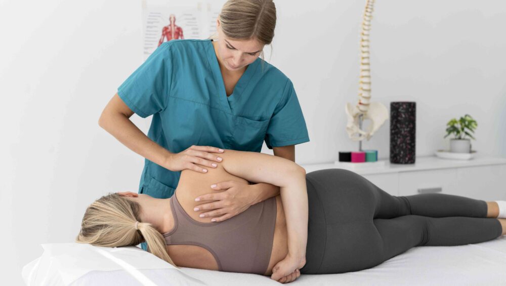 Patient learning about gentle DNFT chiropractic care in Hainesport NJ